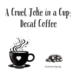 White ceramic coffee mug with black text reading A Cruel Joke in a Cup: Decaf Coffee