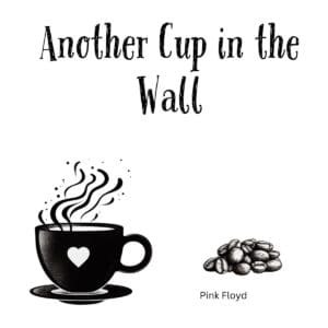 White ceramic coffee mug with "Another Cup in the Wall" quote referencing Pink Floyd's Another Brick in the Wall