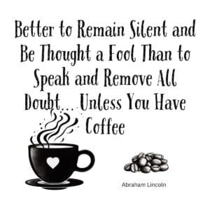 White ceramic mug with Abraham Lincoln quote about silence, foolishness, and coffee printed in black text