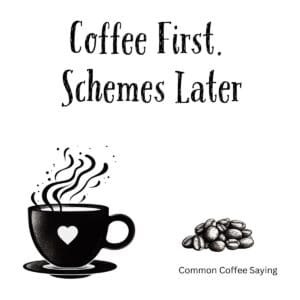 White ceramic coffee mug with black text reading Coffee First. Schemes Later in modern typography