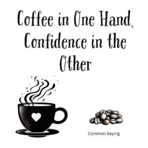 White ceramic coffee mug with quote Coffee in One Hand Confidence in the Other printed in black text
