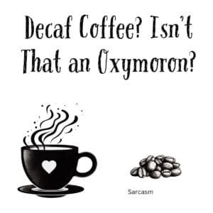 White ceramic coffee mug with black text reading Decaf Coffee Isn't That an Oxymoron in bold letters