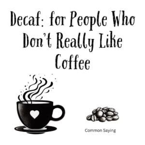 White ceramic coffee mug with black text reading Decaf: for People Who Don't Really Like Coffee