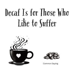 White ceramic coffee mug with black text reading Decaf Is for Those Who Like to Suffer
