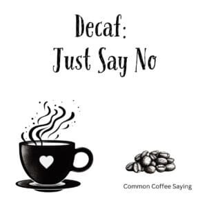 White ceramic coffee mug with black text reading Decaf: Just Say No for coffee lovers who prefer full caffeine