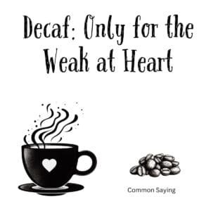 White ceramic coffee mug with black text reading Decaf: Only for the Weak at Heart in bold lettering