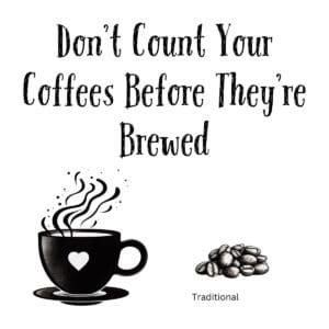 White ceramic coffee mug with black text reading Don't Count Your Coffees Before They're Brewed