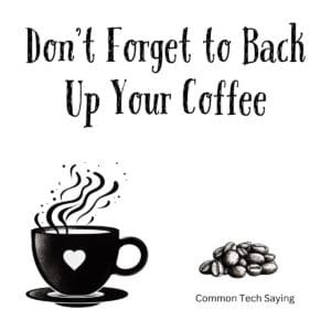 White ceramic coffee mug with black text reading Don't Forget to Back Up Your Coffee on tech-themed background