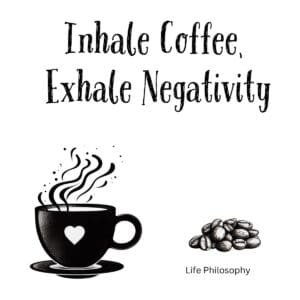 White ceramic coffee mug with black text reading Inhale Coffee, Exhale Negativity