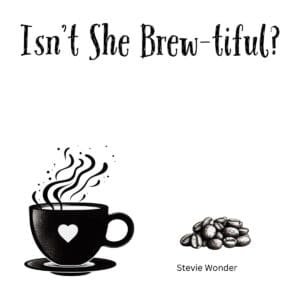 White ceramic coffee mug with "Isn't She Brew-tiful?" quote, a Stevie Wonder song pun for coffee lovers