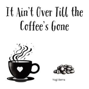 White ceramic coffee mug with quote It Ain't Over Till the Coffee's Gone in black text, inspired by Yogi Berra
