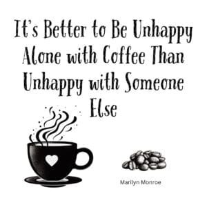 White ceramic mug with Marilyn Monroe quote about being unhappy alone with coffee rather than unhappy with someone else