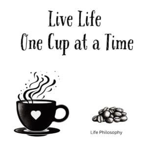 White ceramic coffee mug with black text reading Live Life One Cup at a Time on white background
