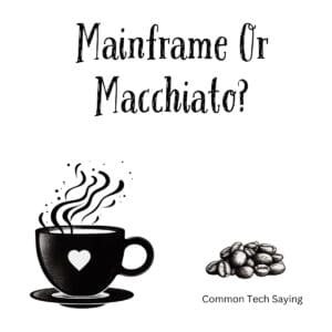 White ceramic coffee mug with "Mainframe Or Macchiato?" quote in black text for tech lovers and programmers
