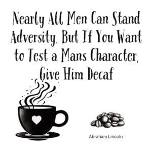 White ceramic coffee mug with Lincoln quote about testing character with decaf instead of power printed in black text