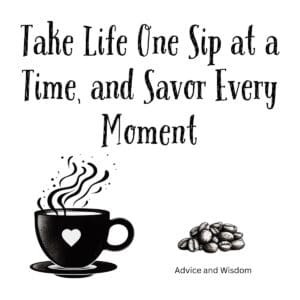 White ceramic coffee mug with black text reading Take Life One Sip at a Time, and Savor Every Moment