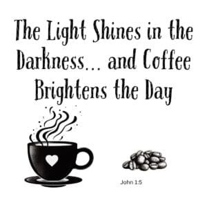 White ceramic mug with quote: The Light Shines in the Darkness and Coffee Brightens the Day, referencing John 1:5