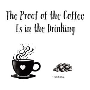 White ceramic coffee mug with black text reading The Proof of the Coffee Is in the Drinking