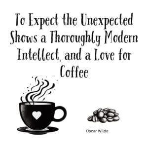 White ceramic coffee mug with Oscar Wilde quote about expecting the unexpected and loving coffee printed in black text