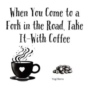 White ceramic coffee mug with Yogi Berra quote: When You Come to a Fork in the Road, Take It—with Coffee