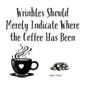 White ceramic coffee mug with Mark Twain quote: Wrinkles Should Merely Indicate Where the Coffee Has Been