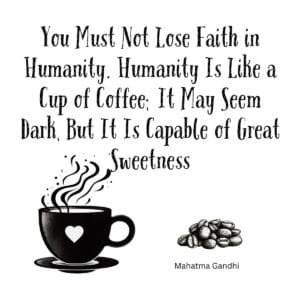 White ceramic mug with Gandhi-inspired quote about humanity being like coffee, dark but capable of great sweetness