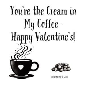White ceramic mug with black text reading You're the Cream in My Coffee happy Valentine's Day quote